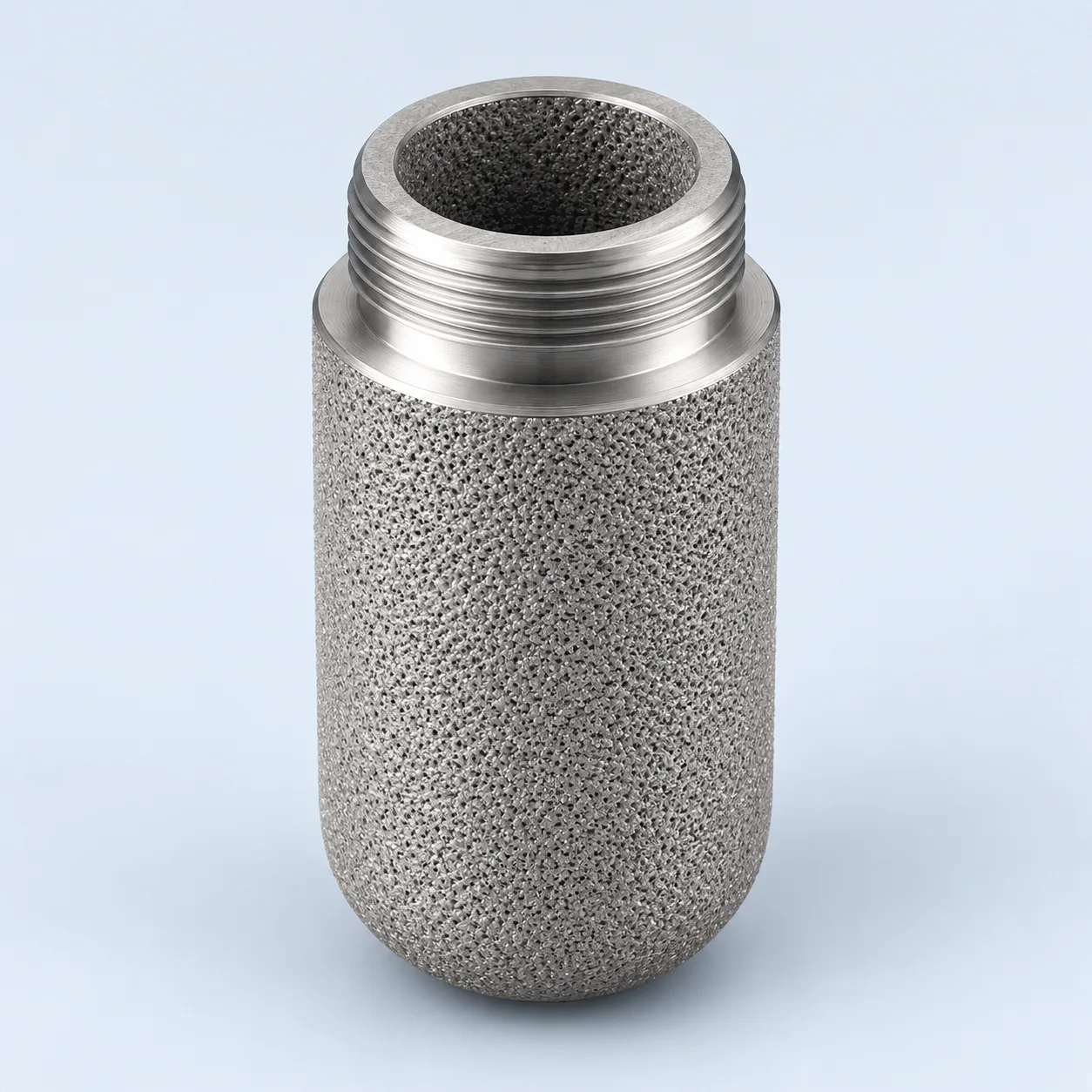 Compact porous sampling cup with an open threaded connection and a closed base.