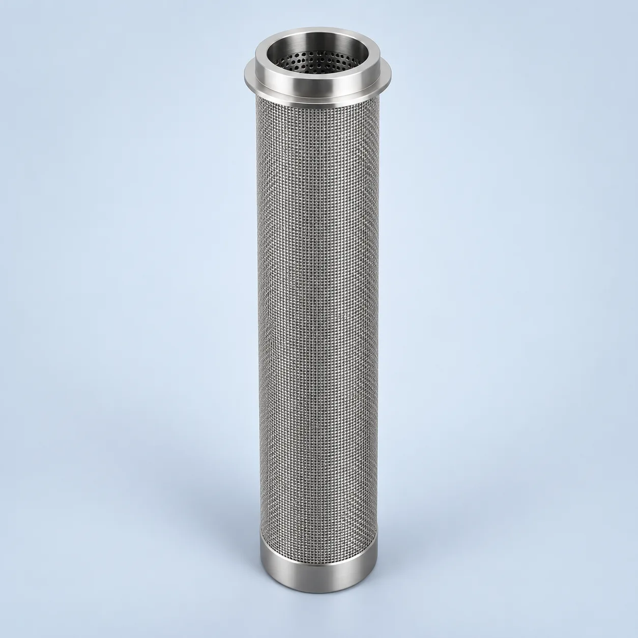 Supported-mesh feed-guard cartridge with an open upper bore and closed lower end.