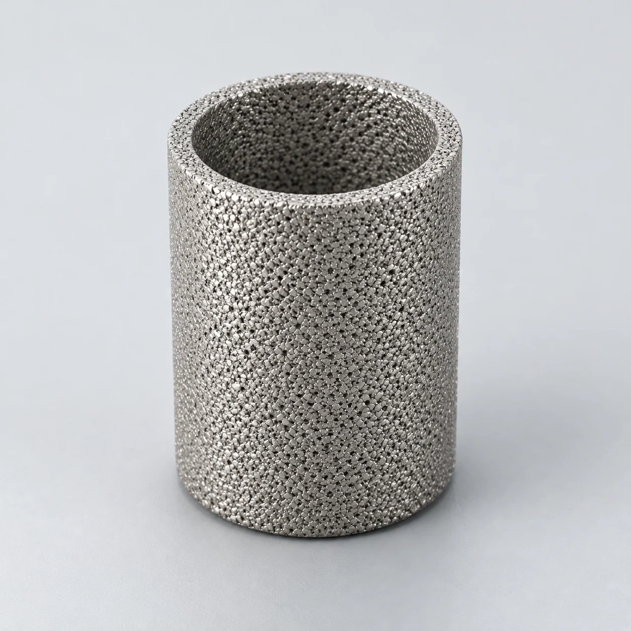 Porous sintered metal powder filter element